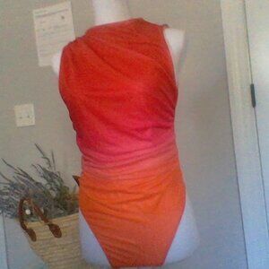 A Shein Red and orange ombre bodysuit.